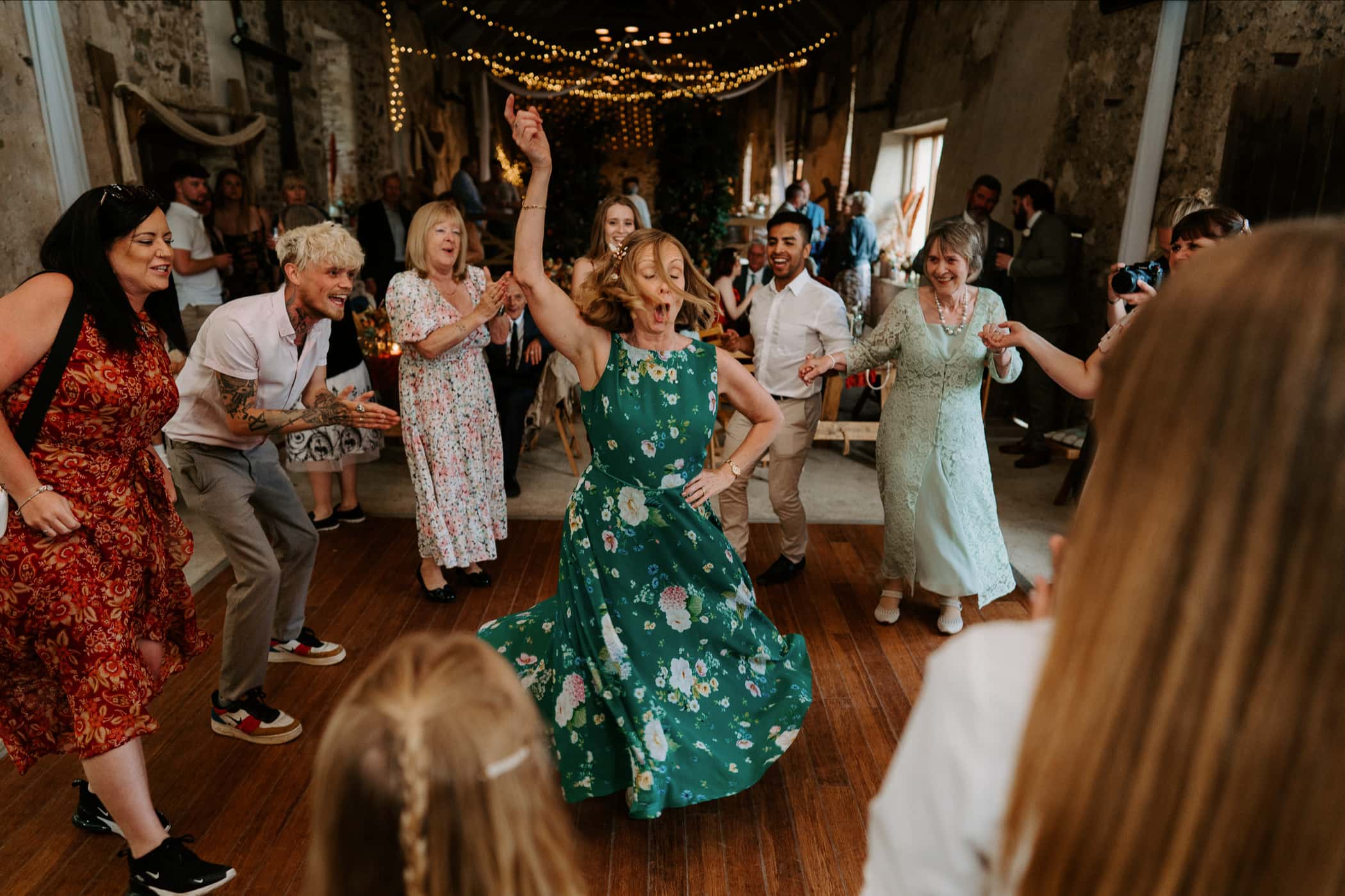 Mother of bride dancing the night away.
